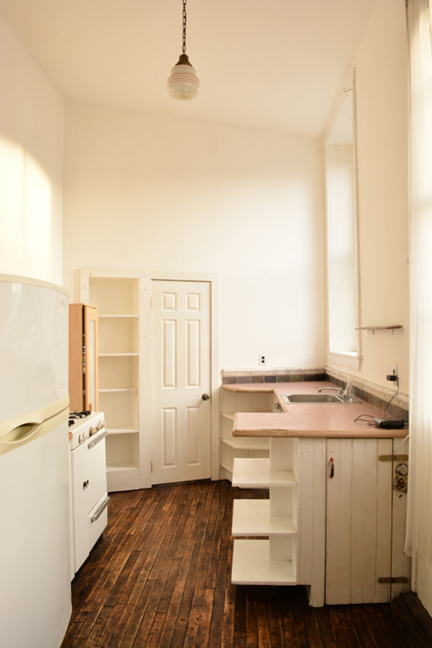 The kitchen alcove is sunny and bright